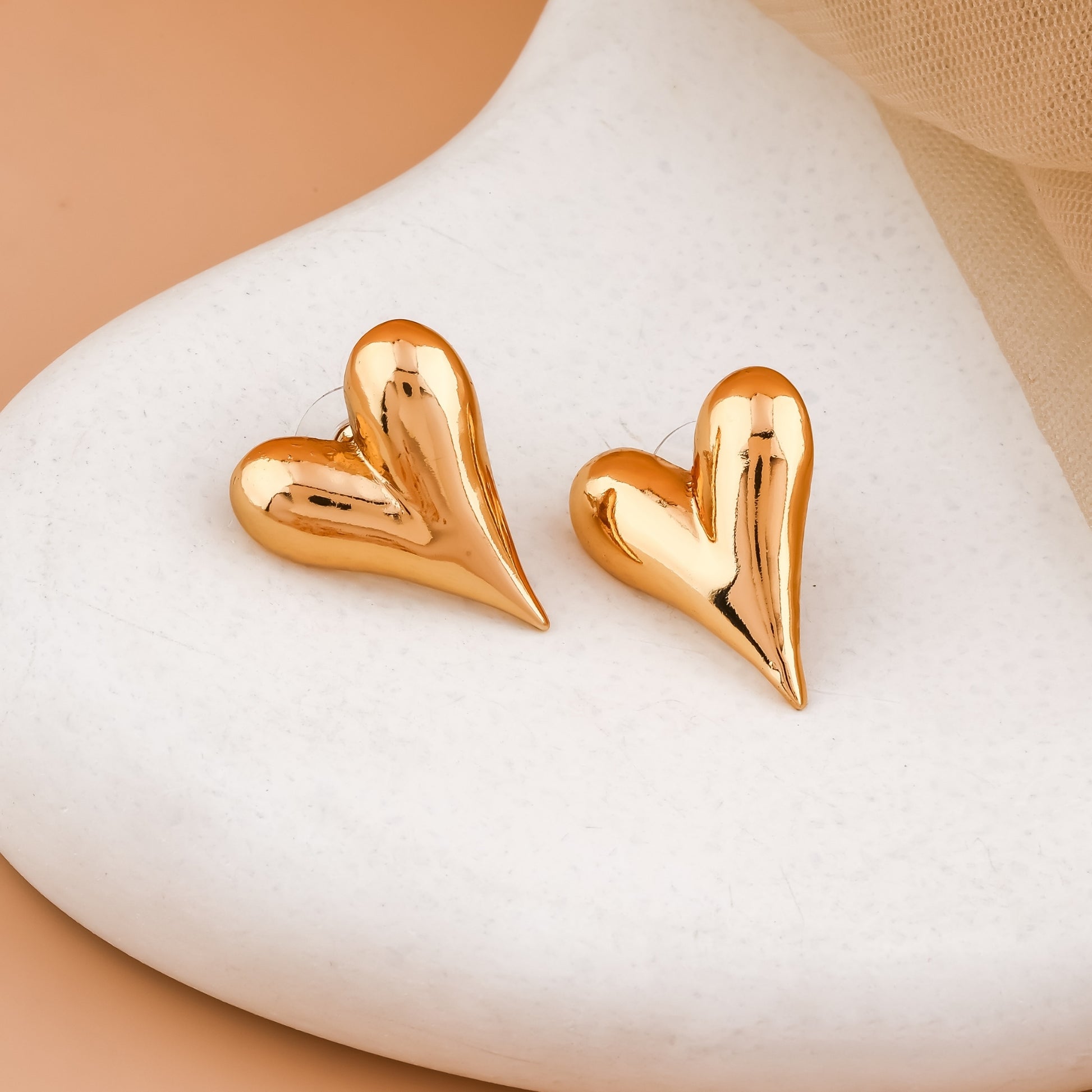 Gold Elongated Heart Stud Earrings