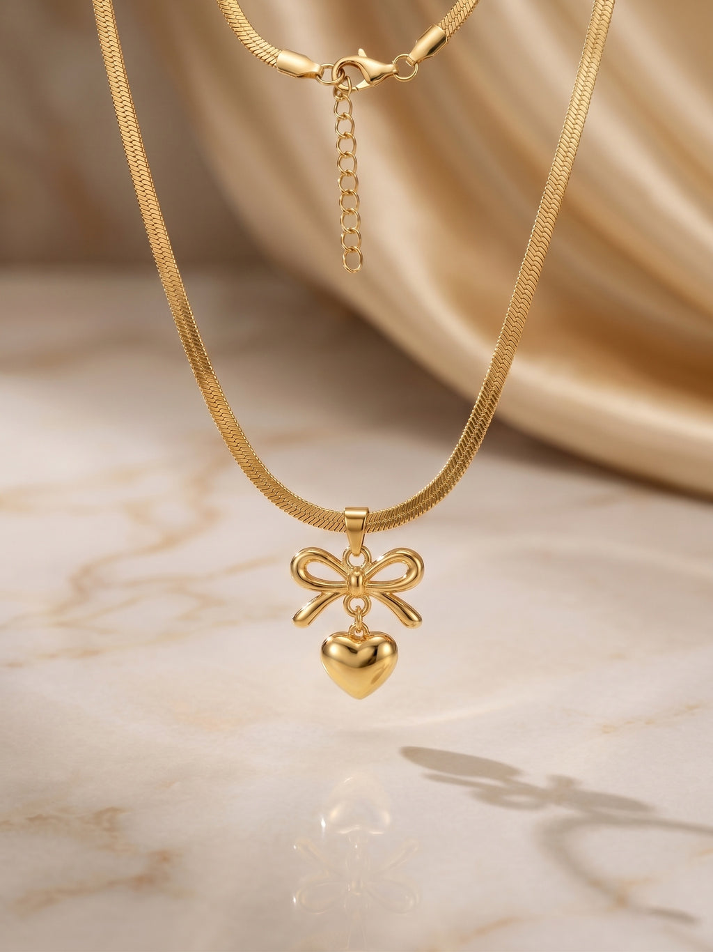 The Juliette Bow & Puffed Heart Herringbone Necklace